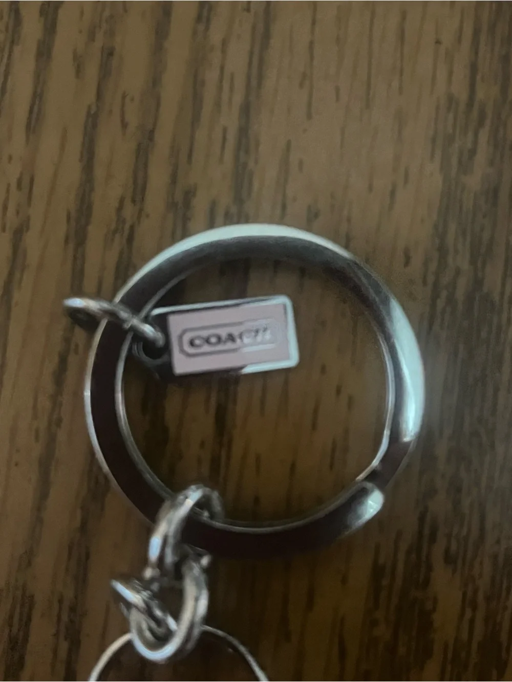 Coach Silver Keyring with Pink Logo Tag